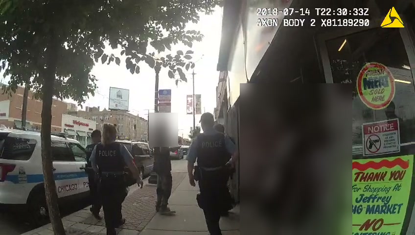 Body camera 2, seconds later: the same sidewalk and the same parked squad car from a second officer's chest camera